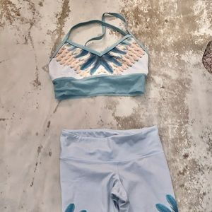 Matching ALO Yoga sports bra and leggings